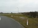 113 Over het gras het fietspad op